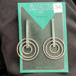 Matching, Elysium Sterling Silver, Ear rings and matching necklace pendant.